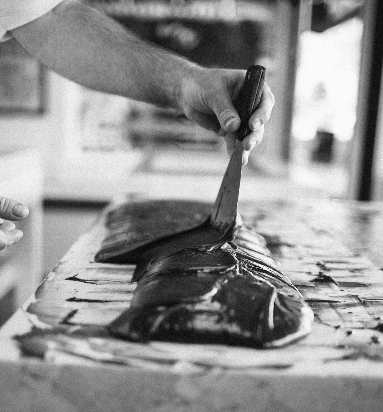 Rybas Fudge Shops Employee making fudge