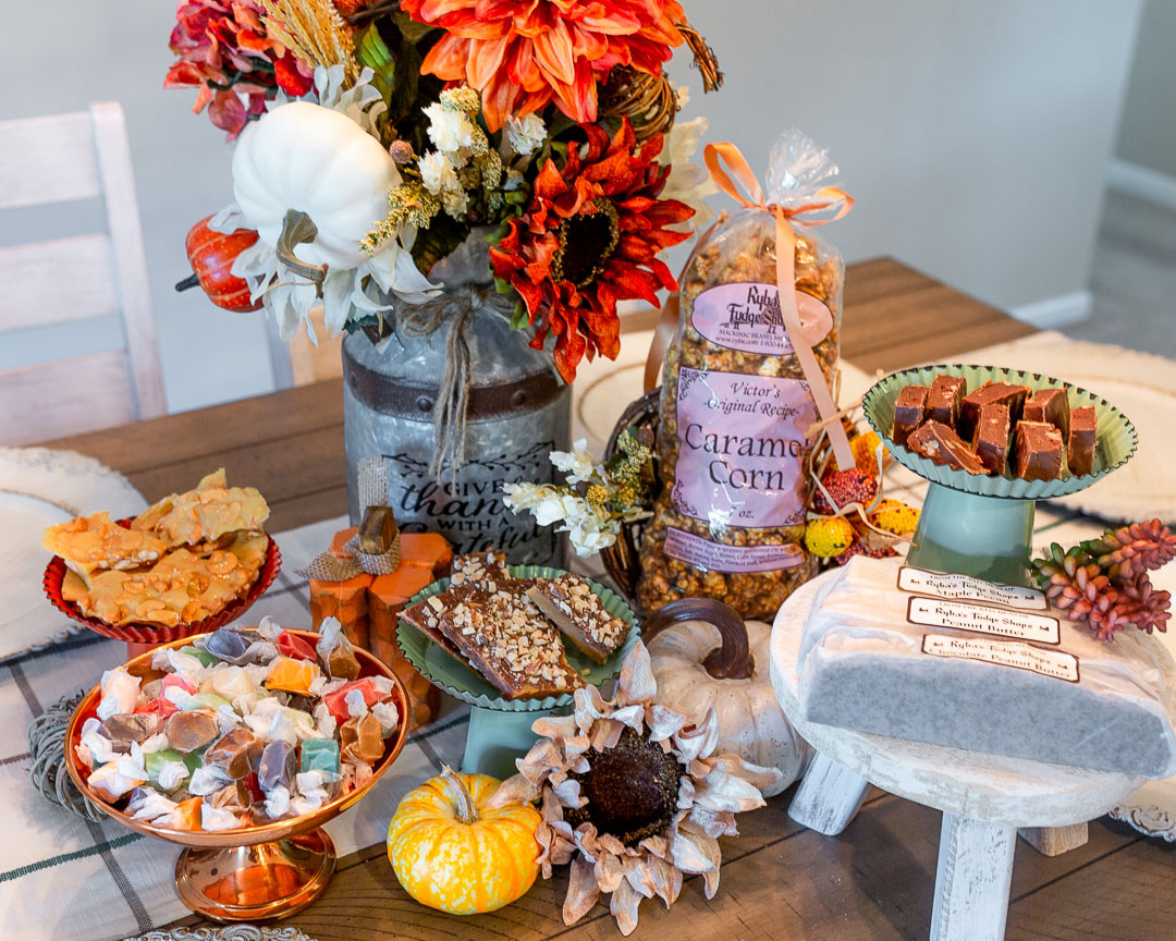Thanksgiving Fudge Gift Basket layout in holiday table spread - Ryba's Fudge Shop